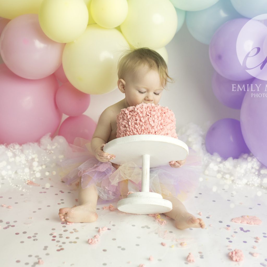 newborn studio session Plymouth Devon Cornwall baby pictures home studio local business rainbow cake smash birthday session happy birthday unicorn pastels girl pink