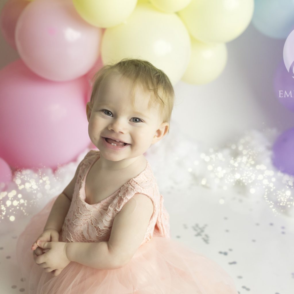 newborn studio session Plymouth Devon Cornwall baby pictures home studio local business rainbow cake smash birthday session happy birthday unicorn pastels girl pink