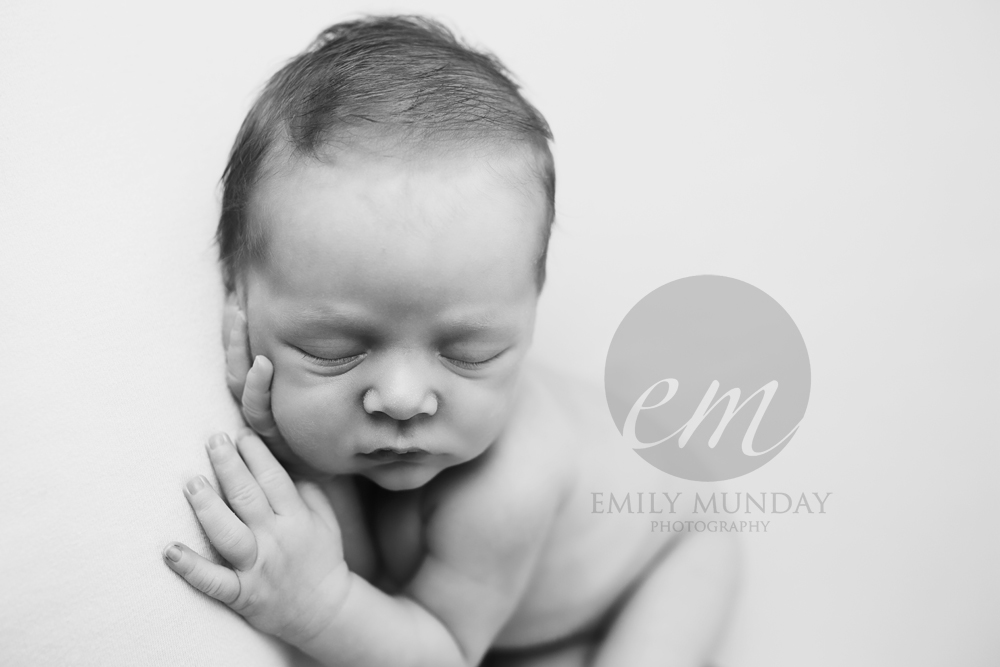 Soothe a new baby Plymouth newborn photographer photos pictures studio award winning Emily Munday