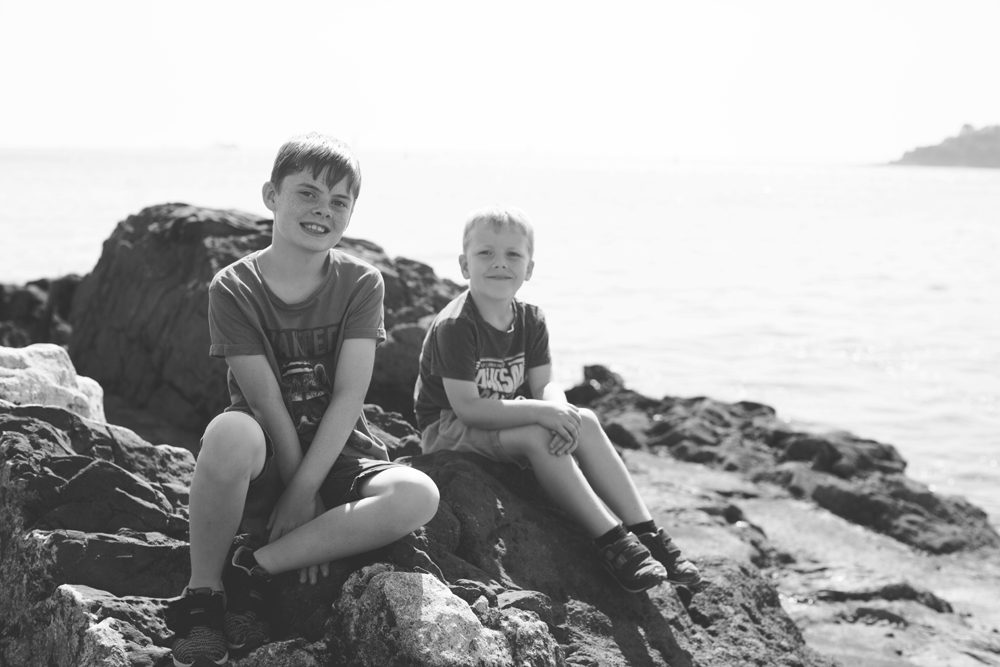 family photo session keeping you safe in Plymouth Devon Hoe cornwall photographer photo shoot location sea beach love parents brothers love