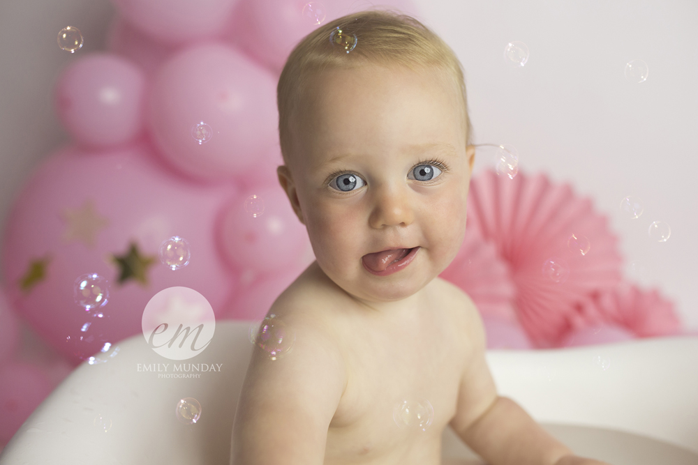 Cake Smash award winning photographer best plymouth newborn photographer cake smash birthday celebration Emily Munday Devon Cornwall Saltash Tavistock pink simple